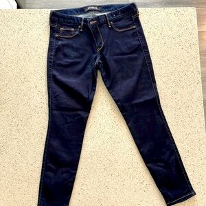 Express blue legging stretch low rise jeans. Size 8Short